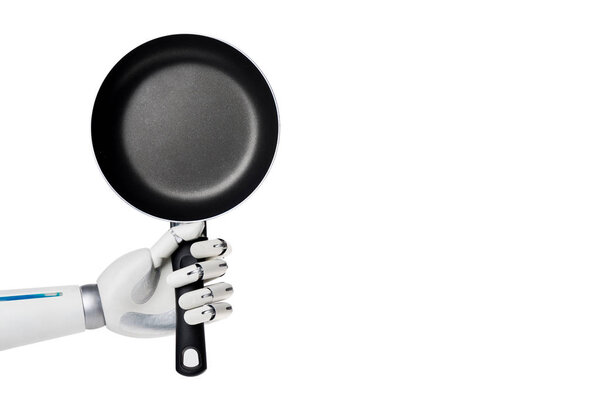 cropped shot of robot holding empty frying pan isolated on white