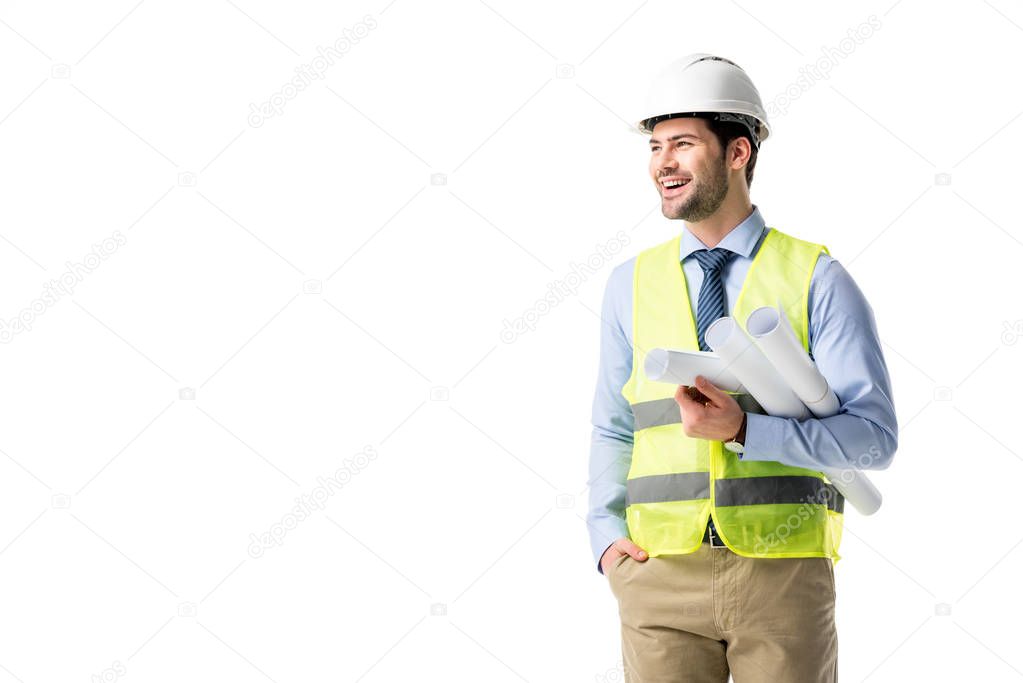 Cheerful construction worker in reflective vest and helmet holding blueprints isolated on white