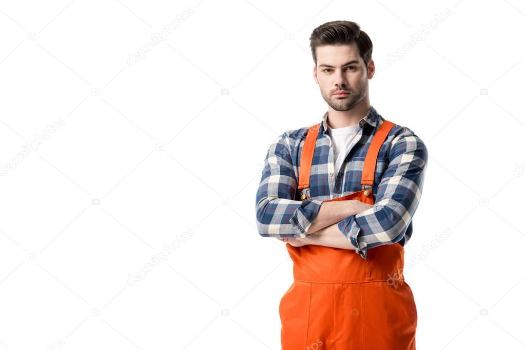 workman in orange overall standing with folded arms isolated on white