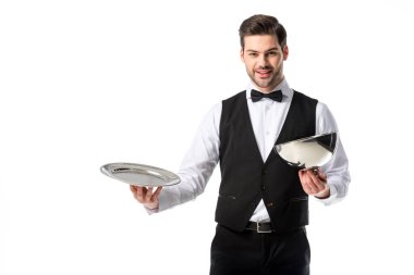 portrait of handsome bearded waiter in suit vest with empty serving tray isolated on white clipart