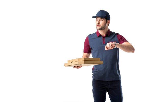 portrait of late delivery man with cardboard pizza boxes isolated on white