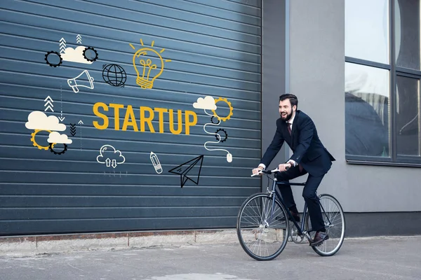 Smiling Young Businessman Suit Riding Bicycle Street Startup Inscription Business — Stock Photo, Image