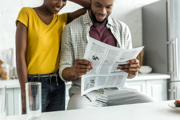 Cropped Image African American Couple Reading Newspaper Kitchen — Stock Photo, Image