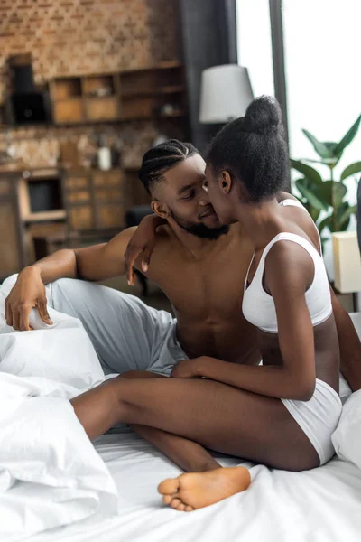 African American Couple Hugging Kissing Bedroom — Stock Photo, Image