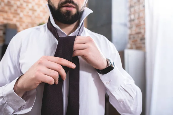 Cropped Image Loner Businessman Tying Necktie Kitchen — Free Stock Photo