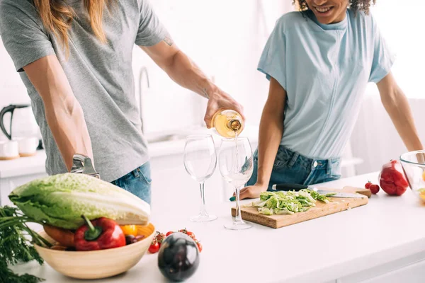 Cropped Shot Man Pouring White Wine Glasses Girlfriend Standing Kitchen — Stock Photo, Image