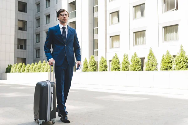 Attractive Young Businessman Stylish Suit Luggage Walking Business District — Stock Photo, Image