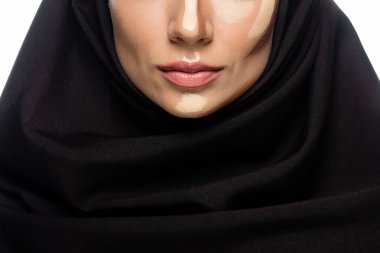 cropped view of young Muslim woman in hijab with facial contouring isolated on white clipart