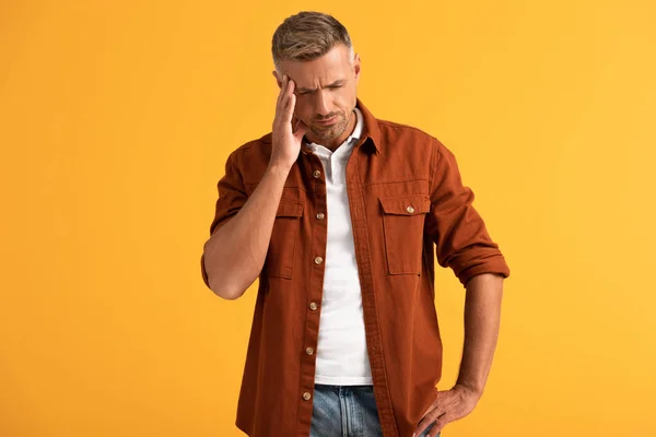 Exhausted Man Touching Temple While Standing Hand Hip Isolated Orange — Stock Photo, Image