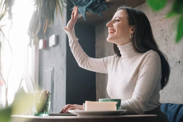 Selective Focus Green Plants Happy Freelancer Using Laptop Waving Hand — Stock Photo, Image