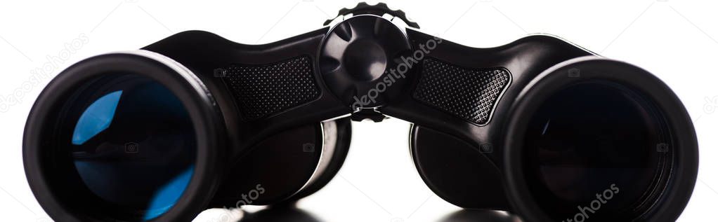 panoramic shot of black binoculars with lens isolated on white 