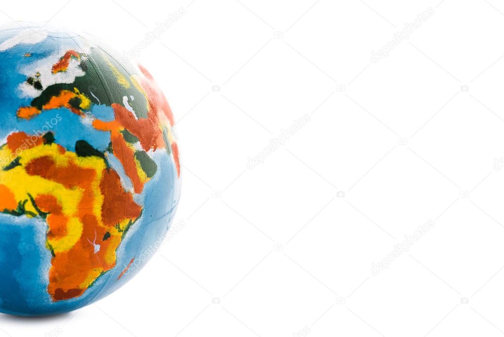 multicolored globe on white with copy space
