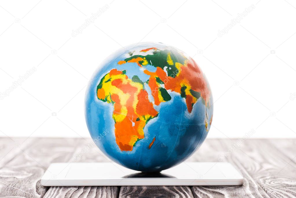 colorful globe on digital tablet isolated on white, e-commerce concept