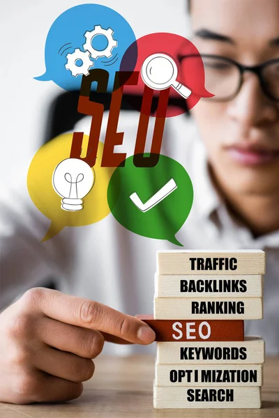 Selective Focus Asian Seo Manager Holding Wooden Rectangle Lettering Seo — Stock Photo, Image