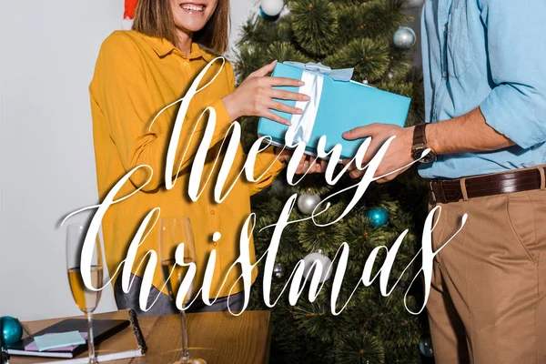 Cropped View Man Giving Present Woman Christmas Tree Merry Christmas — Stock Photo, Image