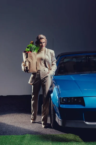 Attractive Stylish Woman Suit Standing Retro Car Holding Paper Bag — Stock Photo, Image