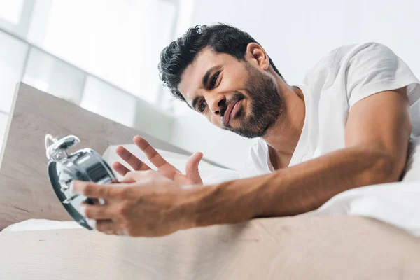 Low Angle View Dissatisfied Racial Man Holding Alarm Clock Morning — Stock Photo, Image