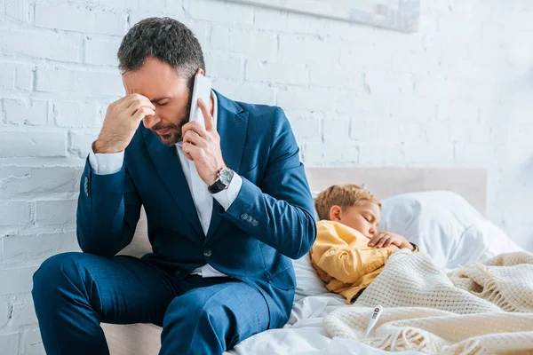 Worried Man Formal Wear Talking Smartphone While Sitting Bed Sick — Stock Photo, Image