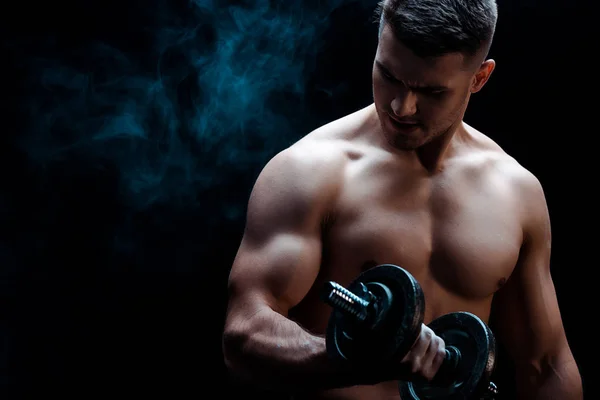 Sexy Muscular Bodybuilder Bare Torso Excising Dumbbell Black Smoke — Stock Photo, Image