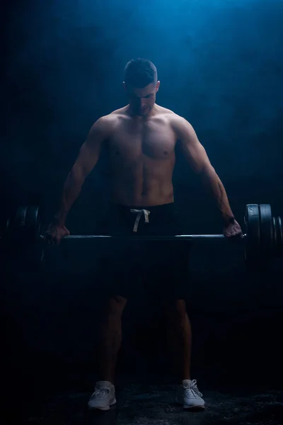 Sexy Muscular Bodybuilder Bare Torso Excising Barbell Black Background Smoke — Stock Photo, Image