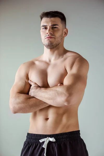 Sexy Muscular Bodybuilder Bare Torso Posing Crossed Arms Isolated Grey — Stock Photo, Image