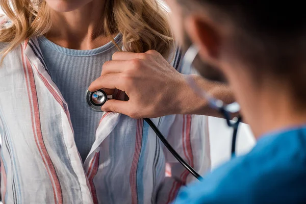 Cropped View Doctor Holding Stethoscope While Examining Woman — Stock Photo, Image