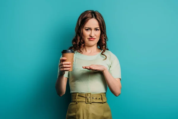 Displeased Woman Showing Refusal Gesture While Holding Coffee Blue Background — 스톡 사진