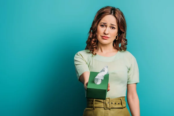 Upset Woman Holding Paper Napkins Looking Camera Blue Background — 스톡 사진