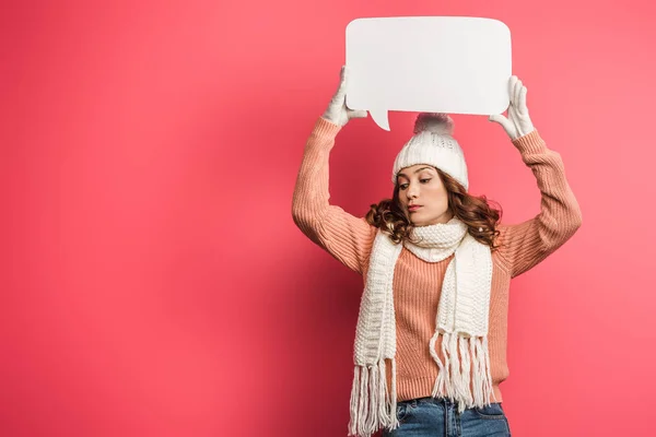 Skeptical Girl Warm Hat Scarf Holding Speech Bubble Pink Background — Stock Photo, Image