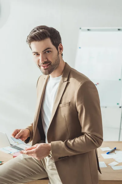 Handsome Designer Looking Camera While Holding Sketches Table — Stock Photo, Image