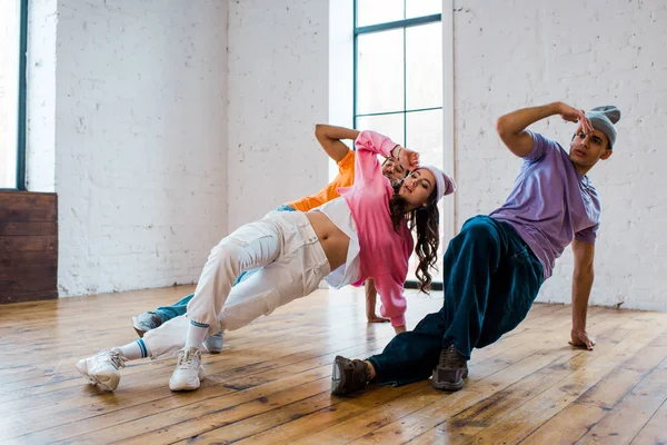 Stylish Multicultural Men Breakdancing Pretty Woman — 스톡 사진