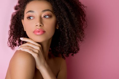 portrait of attractive curly nude african american girl on pink clipart