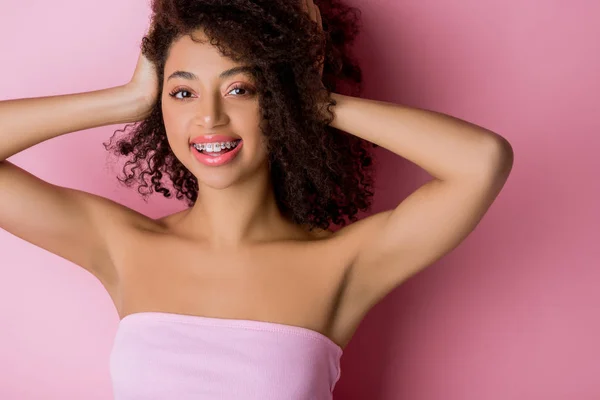 Happy Curly African American Girl Dental Braces Pink — Stock Photo, Image