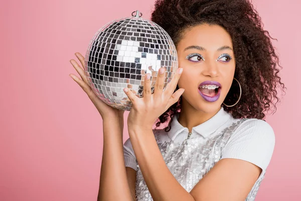 Excited African American Girl Paillettes Dress Holding Disco Ball Isolated — 스톡 사진