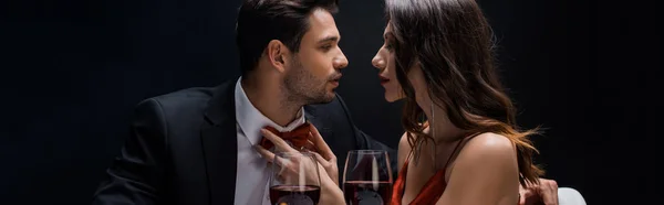 Panoramic Shot Attractive Woman Adjusting Bow Tie Elegant Man Wine — Stock Photo, Image