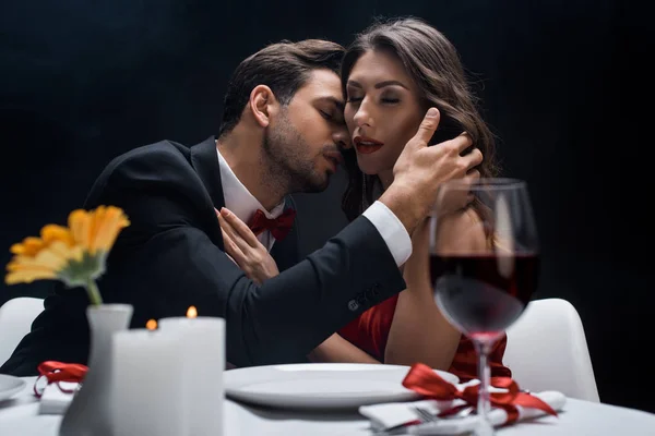 Selective Focus Handsome Man Kissing Beautiful Woman Served Table Isolated — Stock Photo, Image