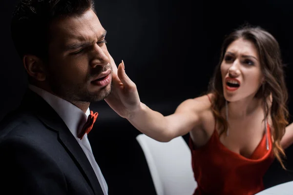 Selective Focus Screaming Woman Slapping Elegant Boyfriend Table Isolated Black — Stock Photo, Image