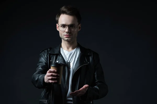 Stylish Brutal Man Biker Presenting Coffee Paper Cup Isolated Black — Stock Photo, Image