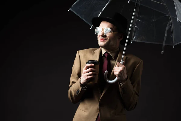 Confused Elegant Man Beige Suit Hat Eyeglasses Holding Umbrella Coffee — Stock Photo, Image