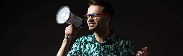 Fashionable Man Eyeglasses Blue Colorful Shirt Shouting Loudspeaker Isolated Black — Stock Photo, Image