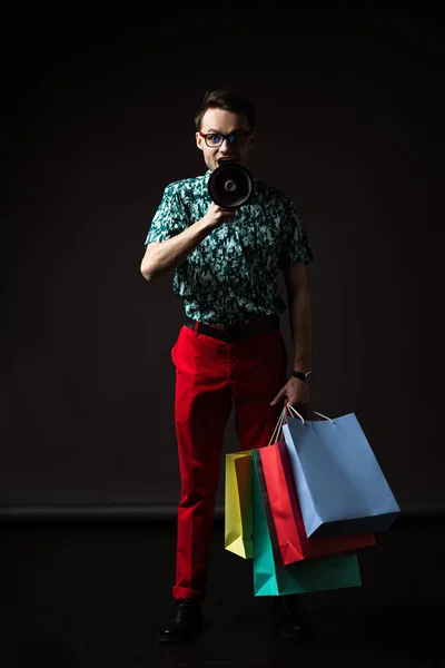 Fashionable Man Eyeglasses Blue Colorful Shirt Red Pants Shopping Bags — Stock Photo, Image