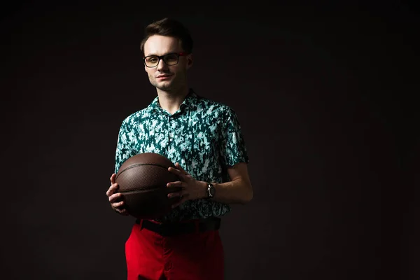 Fashionable Man Eyeglasses Blue Colorful Shirt Red Pants Holding Basketball — Stock Photo, Image