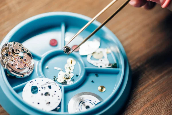 Cropped View Watchmaker Holding Watchpart Tweezers Parts Tool Tray Table — Stock Photo, Image