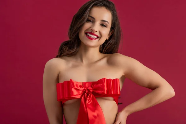 Seductive Girl Wrapped Red Satin Ribbon Bow Smiling Camera Isolated — 스톡 사진