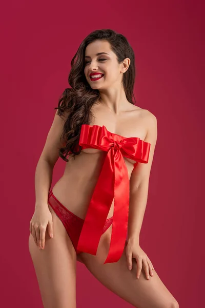 Sensual Girl Wrapped Red Satin Ribbon Bow Smiling While Looking — 스톡 사진