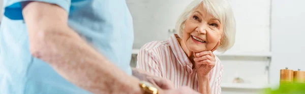 Selective Focus Smiling Senior Woman Looking Husband Home Panoramic Shot — 스톡 사진