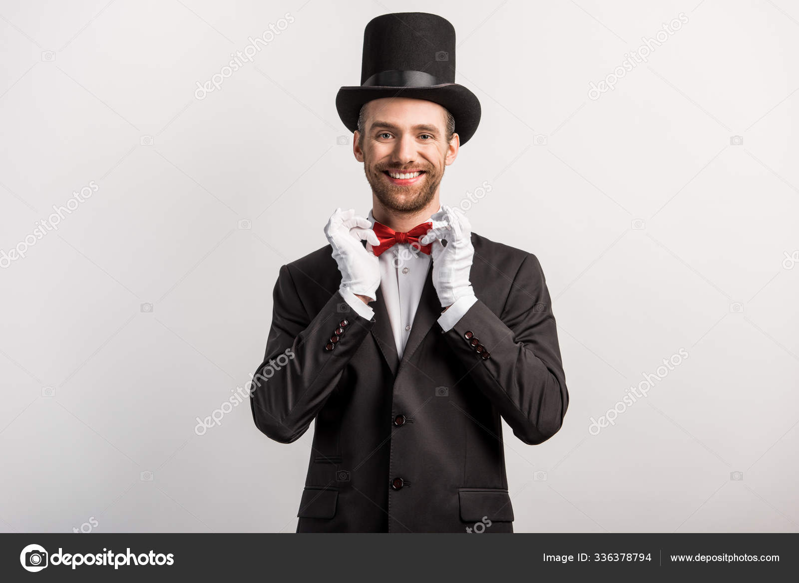 Handsome Smiling Magician Adjusting Red Bow Tie Isolated Grey Stock ...