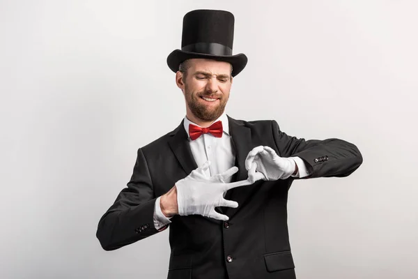 Emotional Magician Taking Gloves Isolated Grey — Stock Photo, Image