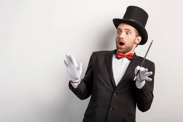 Shocked Magician Open Mouth Holding Wand Isolated Grey — 스톡 사진
