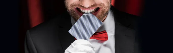 Cropped View Smiling Magician Holding Playing Card Teeth Circus Red — Stock Photo, Image